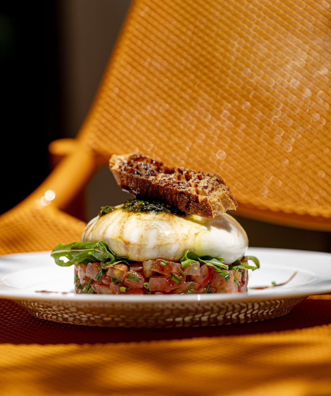 Briganti burrata Burrata with arugula, tomato tartare, and balsamic-drizzled crostini at Briganti, Casablanca