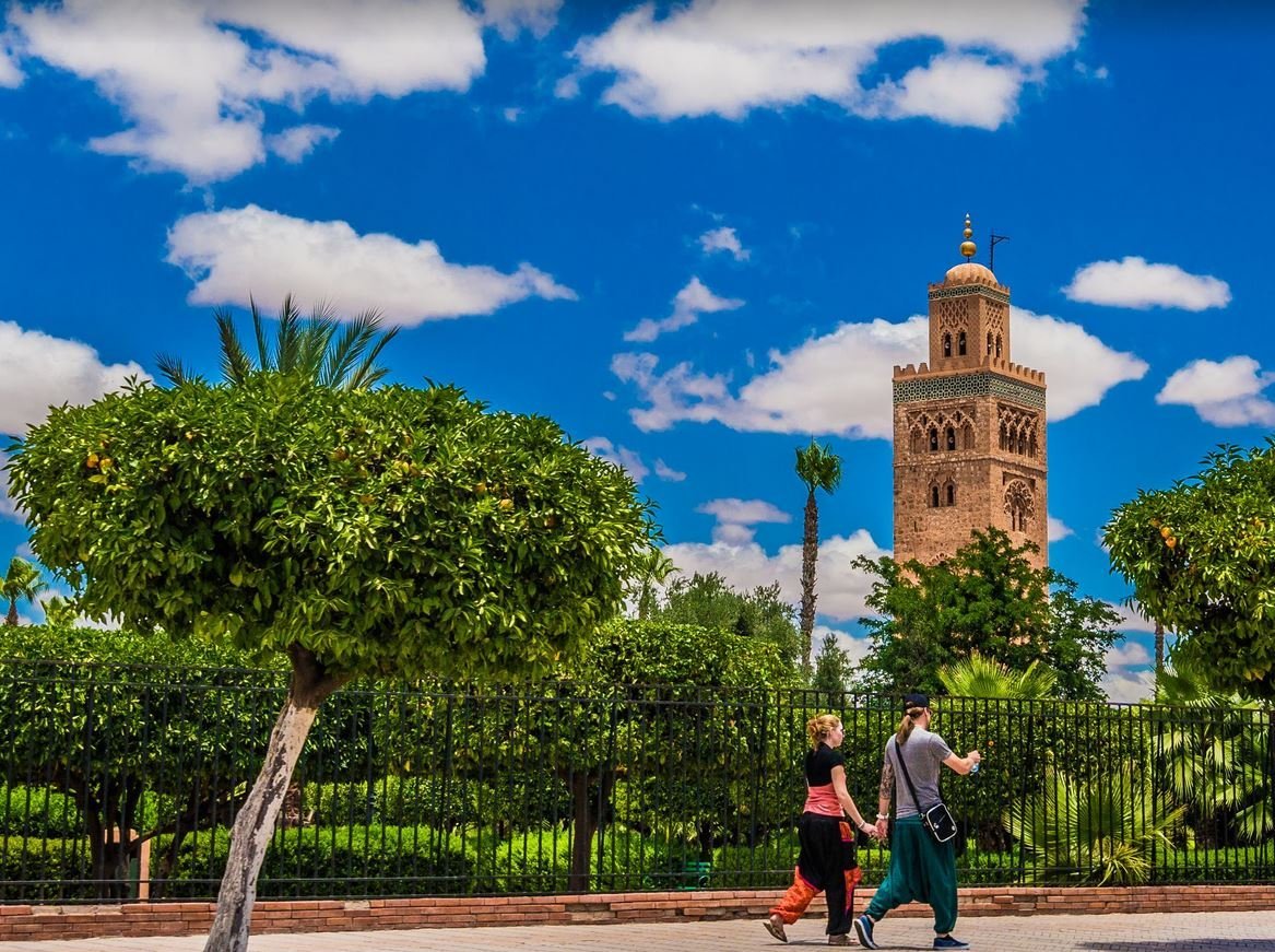 Koutoubia Mosque, Marrakech The Koutoubia Mosque minaret rising above the orange trees of its gardens in Marrakech