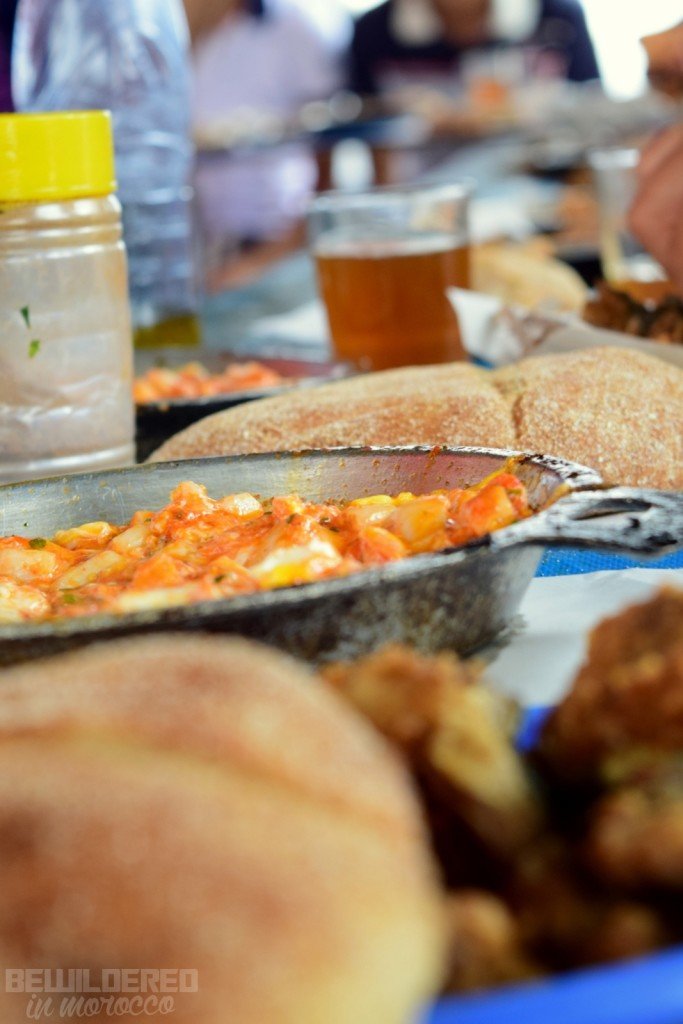 Mkila, eggs with tomato sauce and hrimps