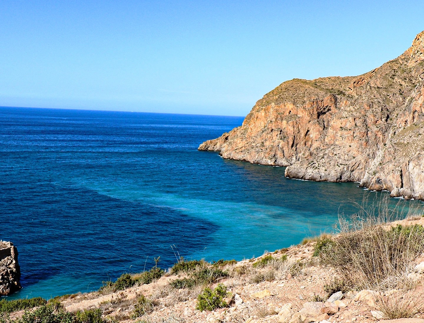 Discover Badis, Morocco's secret Mediterranean beach near Al Hoceima. Pristine waters, historic island views, and authentic fishing village charm await.